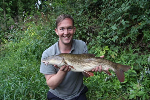 James with a 6lbs 15oz barbel 