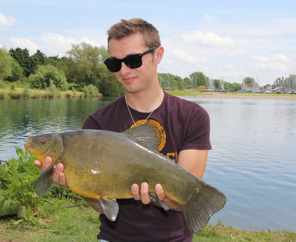 Chris with his 8lbs 8oz tench 