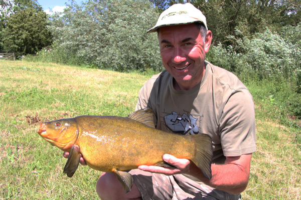 Mark and his 7lbs 4oz tench a