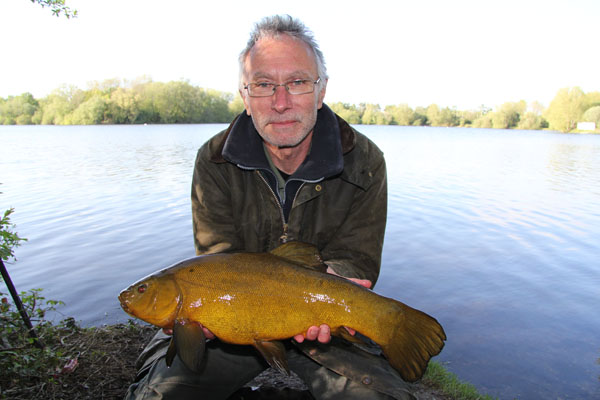 Jeff and a beautiful 5lbs 12oz tench