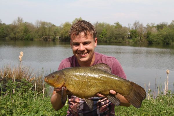 Kerion and his 8lbs 12oz tench 