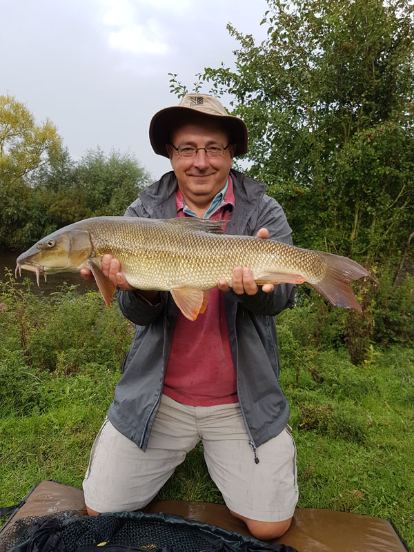 Roger and a 7lbs 13oz barbel